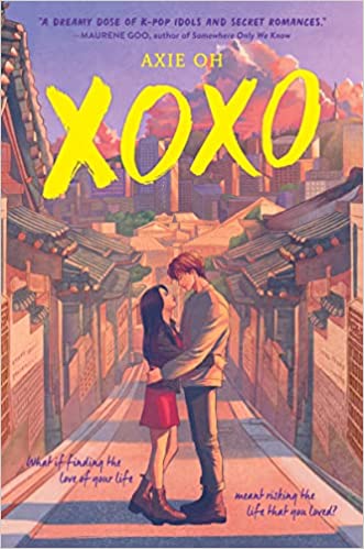 'XOXO' by Axie Oh book cover showing a young couple embracing in the middle of a road