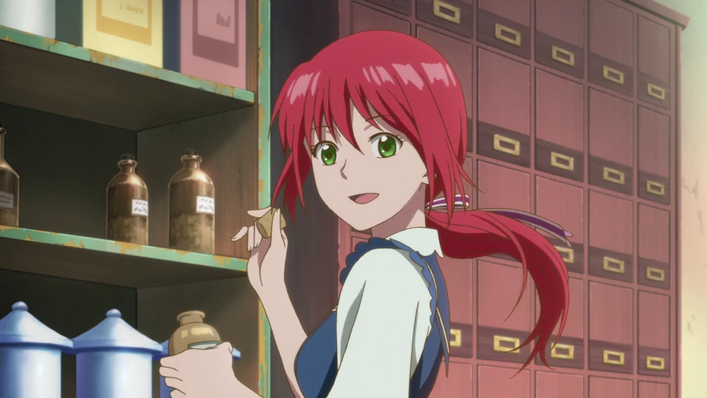 Shirayuki from Snow White With the Red Hair in front of her apothecary shelf.