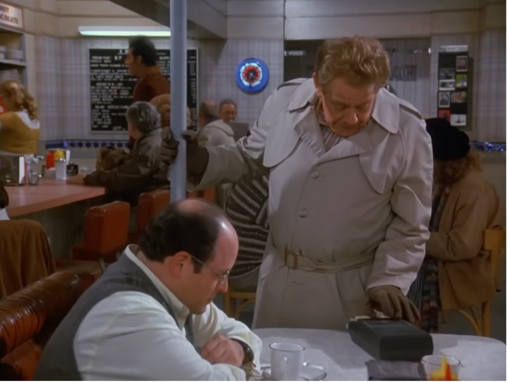 Frank visits George in the coffee shop with the aluminum pole and tape recorder in hand. He plays a tape for George to get him in the Festivus mood, which ends in George storming out of the coffee shop.