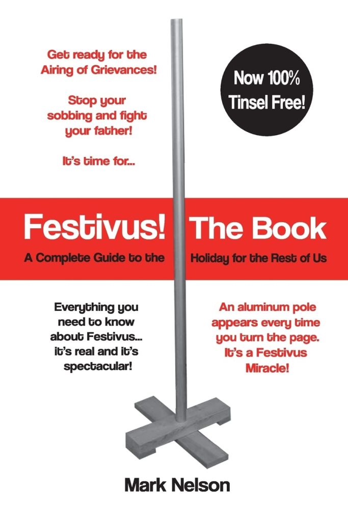 Book cover of Festivus! The Book by Mark Nelson, depicting an aluminum pole on a white background. The book title is placed inside a red stripe across the middle of the cover.
