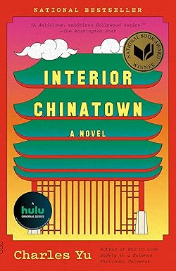 Book cover for Interior Chinatown by Charles Yu. It has a red background with a center area in pink and yellow hues and a green-roofed outline of a Chinese traditional building. There is a sticker on the cover advertising that this book is now also a hit TV series on Hulu.