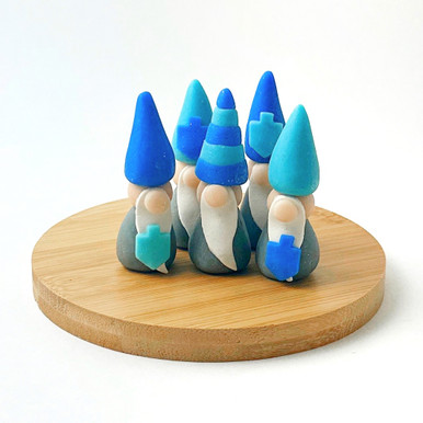 An image showing marzipan shaped like blue-themed gnomes.
