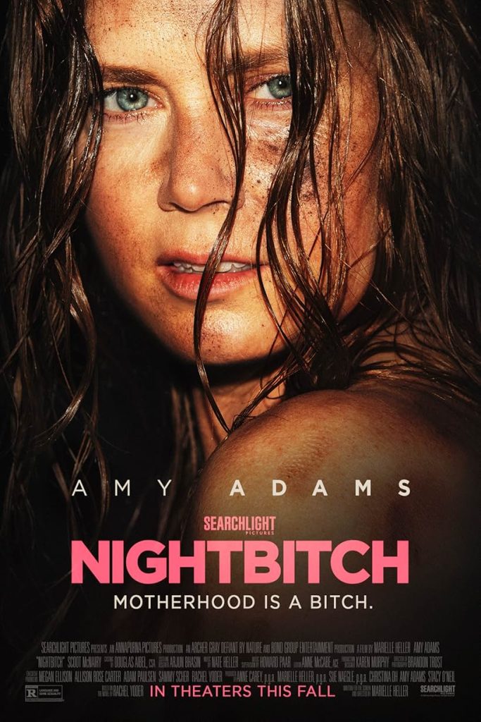Poster for the movie Nightbitch, starring Amy Adams. The pink title contrasts with the close-up of Amy Adams.