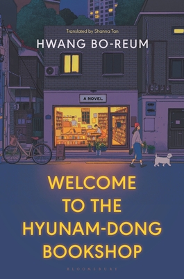 Book cover for Welcome to the Hyunam-Dong Bookshop by Hwang Bo-Reum. It features a nighttime streetside view of a small bookshop in a small town in Korea.