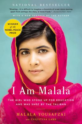 A young woman with a pink headscarf looks straight ahead on the cover of I Am Malala.