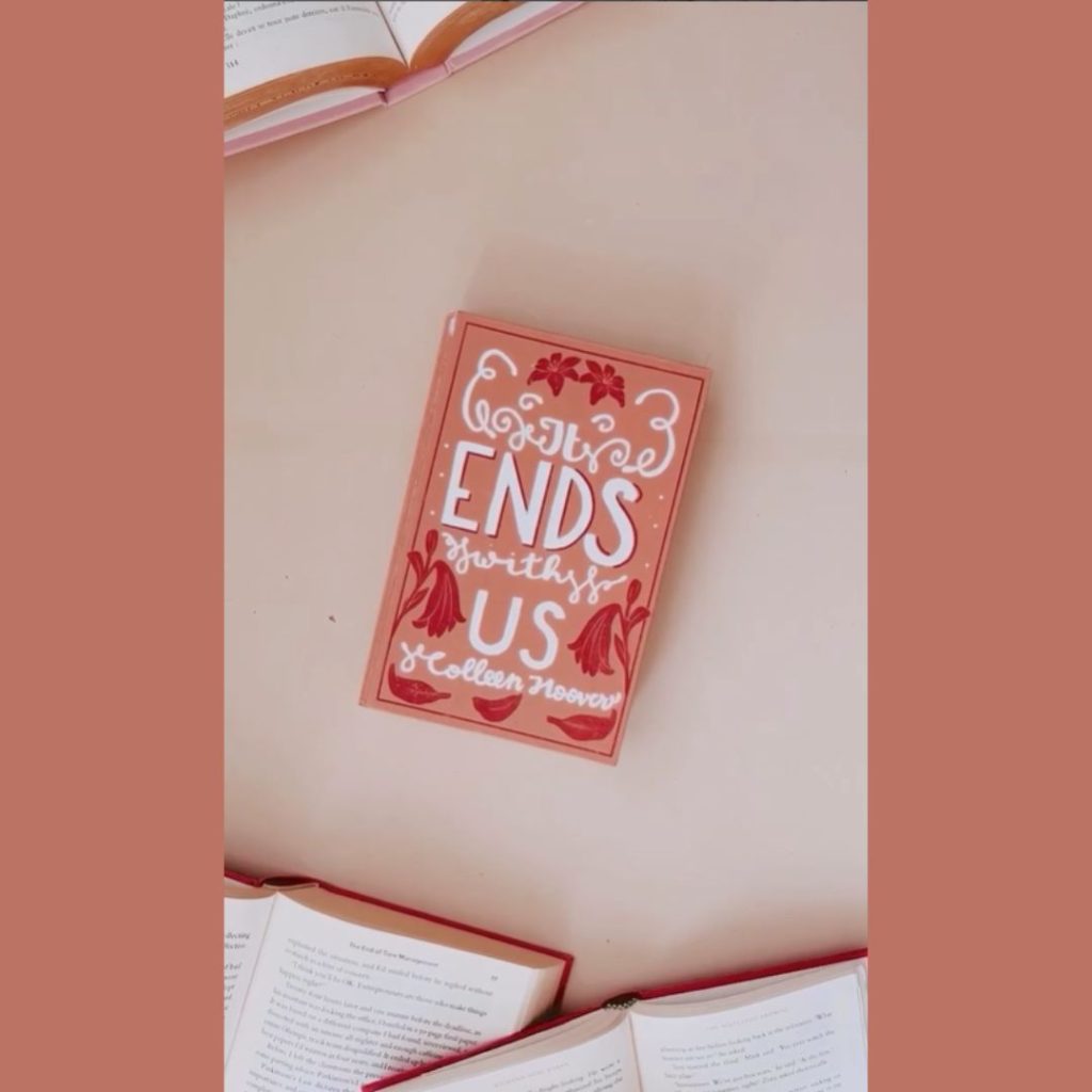 It Ends With Us by Colleen Hoover handmade book cover. Them of white, burnt orange, and dark red.