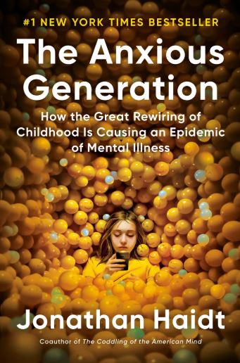A young girl is on her phone, drowning in smiley faces on the cover of The Anxious Generation.