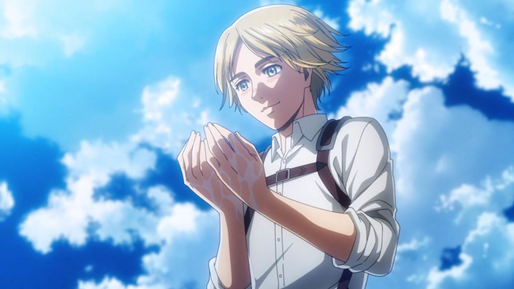 Armin Arlet looking at his wet hands with a smile