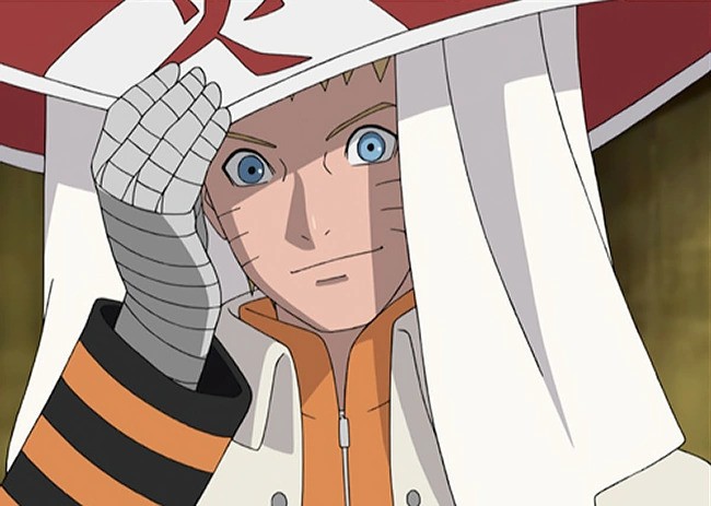 Naruto smiling while touching the Hokage hat on his head