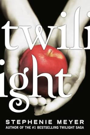 Twilight by Stephenie Meyer book cover with two pale hands cupping a bright red apple.