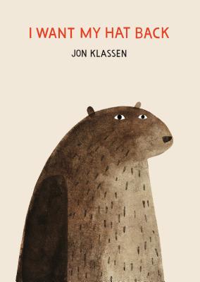 A bear stands alone on I Want My Hat Back by Jon Klassen.