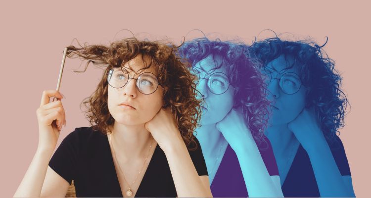 A woman with glasses thinks with glasses on.