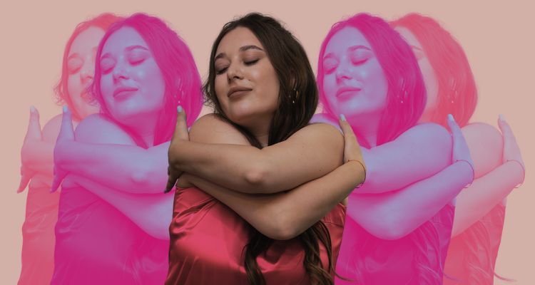 A woman hugs herself with echoes of her image behind her on either side.