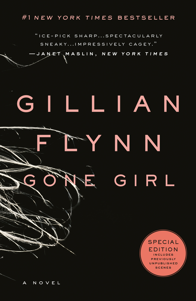 Strands of blonde hair splinter a black background like glass for the cover of Gone Girl.