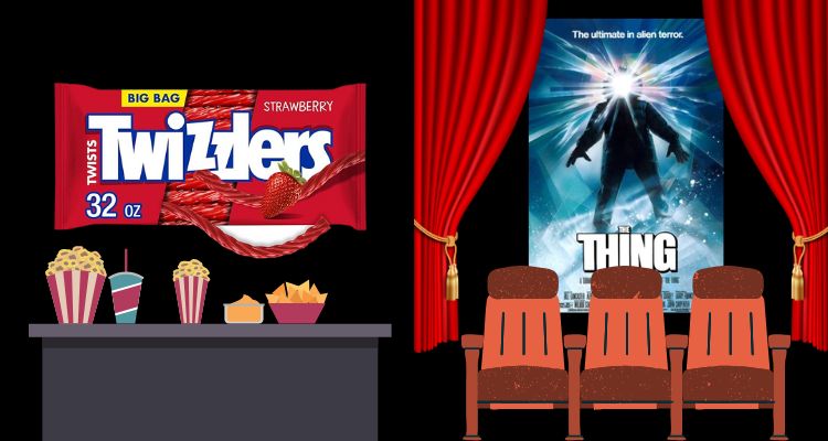 A snack stand with twizzlers behind it and a small movie theater showing the thing.