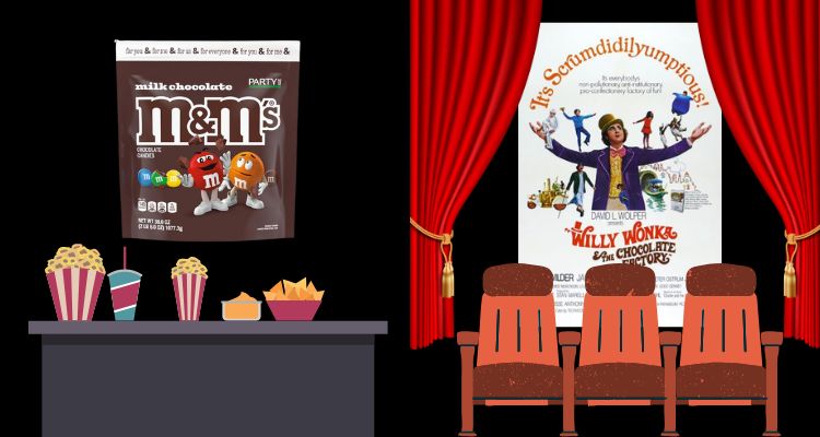 A snack stand with m&ms and a movie theater showing willy wonka.
