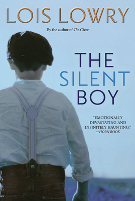 The back of a boy dressed in a white shirt, suspenders, and a flat clap. A light blue background. The Silent Boy in blue lettering.