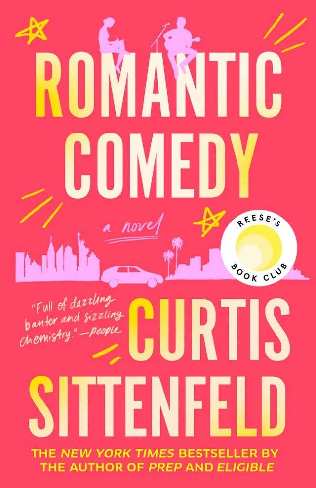 A dark pink background. Pale purple silhouettes of two city skylines, a car, and a man and woman. The woman sits writing and the man has a guitar in his lap and sits in front of a microphone. Some yellow stars and starburst drawings. Romantic Comedy in white and yellow gradient lettering.