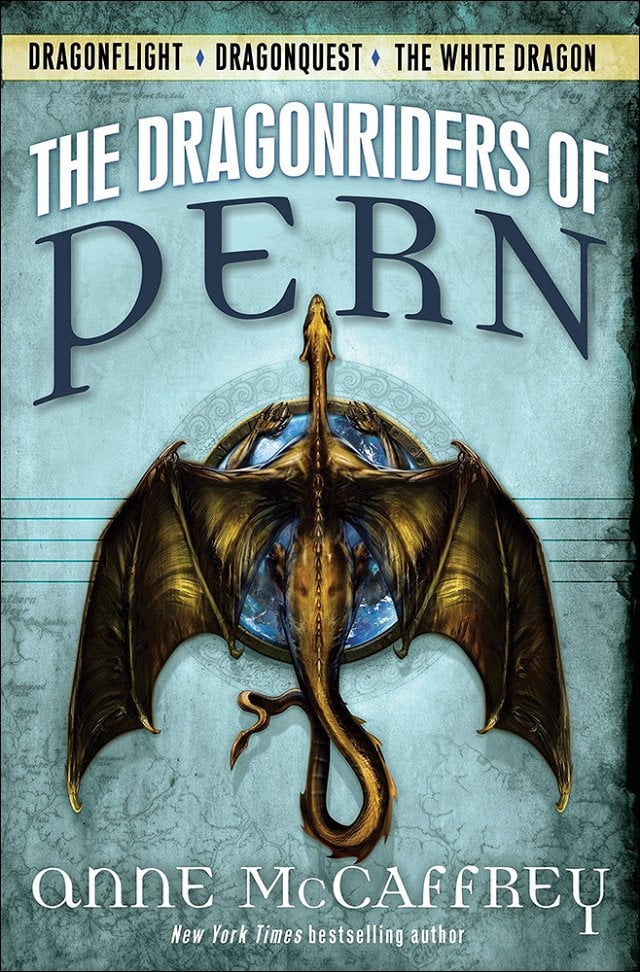 Cover of The Dragonriders of Pern by Anne McCaffrey, featuring a golden-winged dragon emblem set against a blue celestial background. The book includes Dragonflight, Dragonquest, and The White Dragon.
