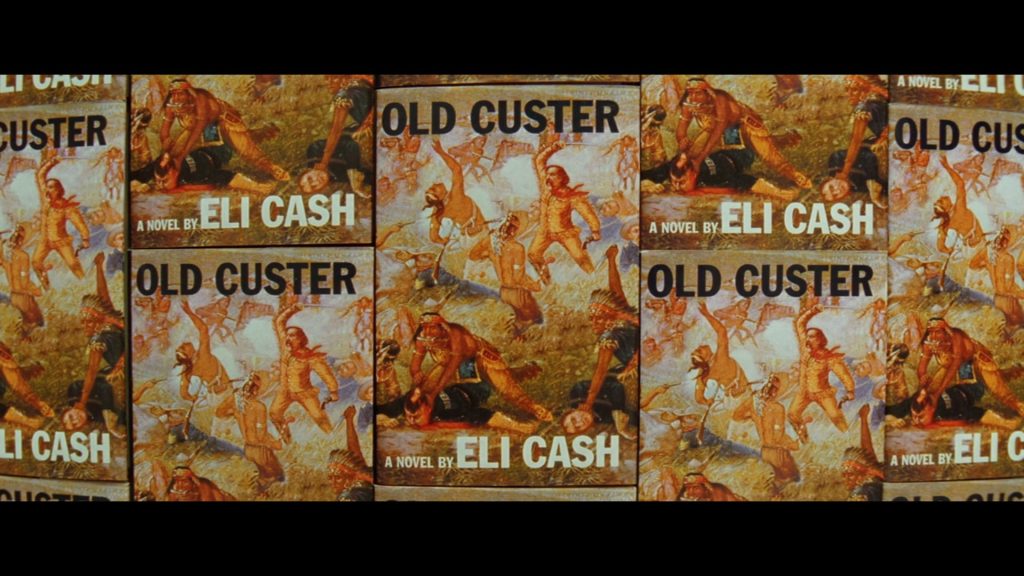 A background that features the cover for the book Old Custer over and over. The cover has an illustration of a Western battle scene between American soldiers and Native American warriors.