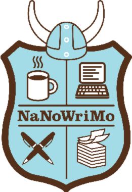 The logo for the writing nonprofit NaNoWriMo, consisting of a sky-blue shield with a dark outline on a white background. At the top of the shield is a light blue Viking helmet with white horns and white circles running down the middle. The design on the shield is divided into four quadrants. Clockwise from top left, the quadrants depict a mug of coffee, an open laptop, a stack of paper with the top two pages being lifted off, and two pens crossed in an "x". In the middle of the shield is the name "NaNoWriMo."