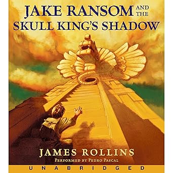 Book cover for Jake Ransom and the Skull King's Shadow by James Rollins and performed by Pedro Pascal. It depicts a young boy, dressed as an adventurer, climbing the steps of a pyramid towards a golden sculpture.