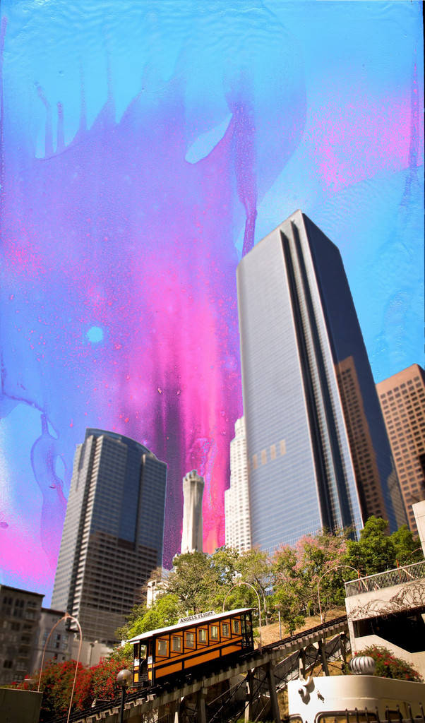 A collage painting. The background is an abstract splatter of blue, purple, and pink paint. The foreground is a city scape.
