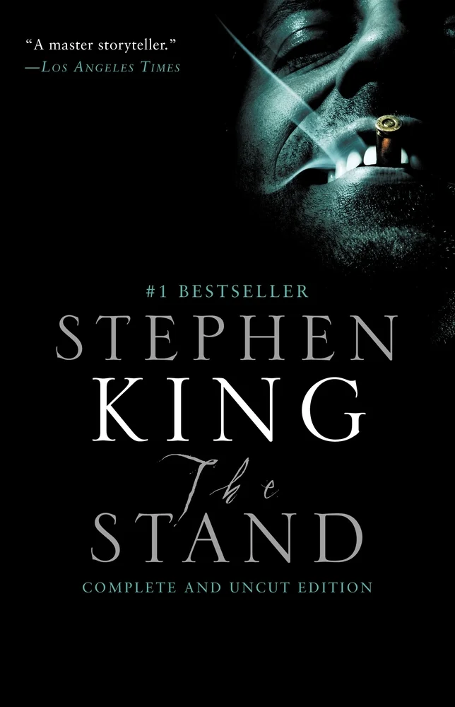 The Stand by Stephen King, book cover depicting a Black background with a heavily shadowed sinister man in the upper corner, smoking a cigar and grinning.
