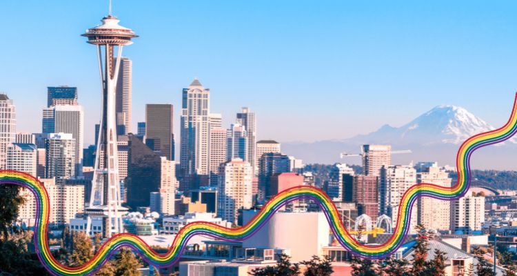 Skyline shot of Seattle, showing the space needle and mount Rainier in the background. A rainbow ribbon is going acorss the image of the skyline.