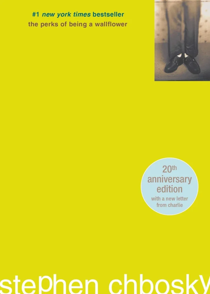 The Perks of Being a Wallflower by Stephen Chbosky, depicting a yellow-green background and lowercase title and writing. There is a small picture in the top right of the book showing someone from the hips down in slacks and dress shoes.
