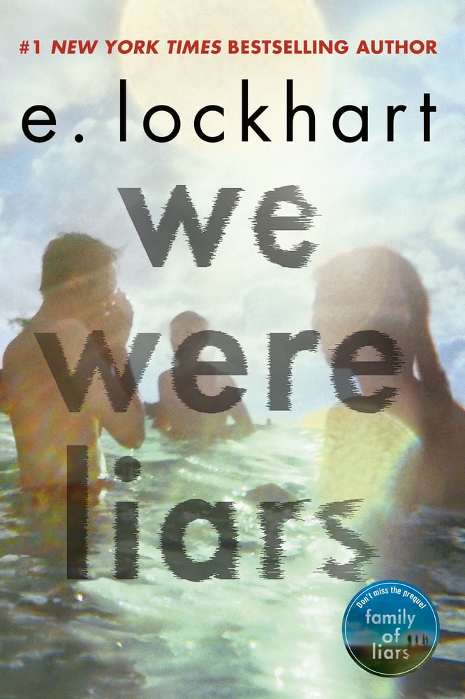 We Were Liars by E. Lockhart book cover, depicting a blurry image of people in a body of water. The title is in grey, transparent letters that seem to be fading.