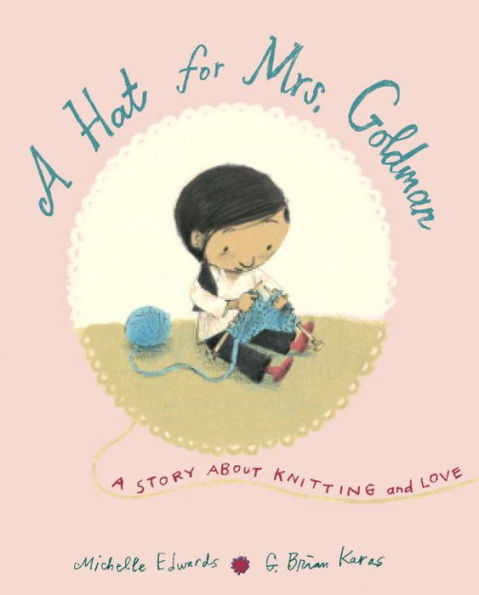 Book cover of "A Hat for Mrs. Goldman" showing a child knitting with blue yarn; subtitle reads "A Story About Knitting and Love" by Michelle Edwards, illustrated by G. Brian Karas.