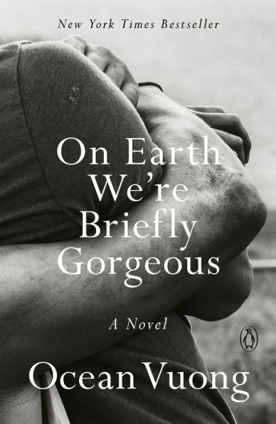 The image features a close-up black-and-white photograph of two people embracing, their arms wrapped tightly around each other. The title is overlaid in bold, white text.