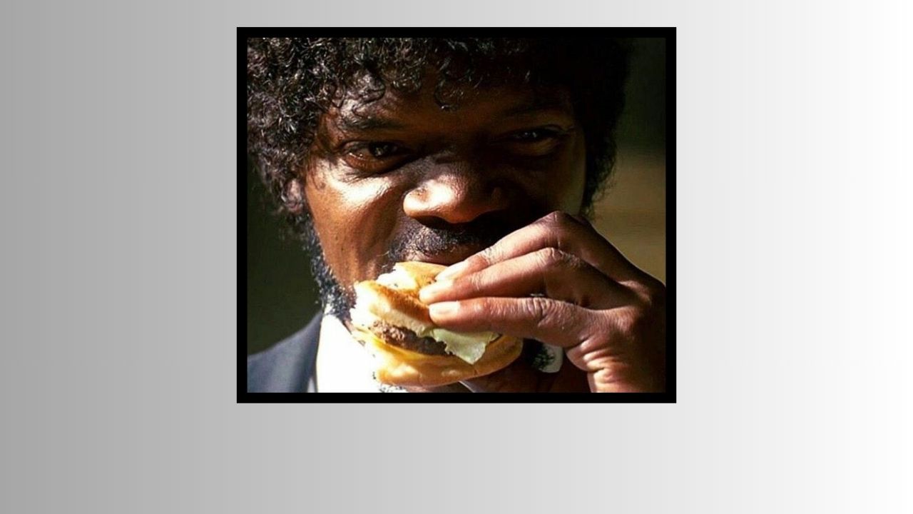 Screenshot from Pulp Fiction, of Samuel L. Jackson eating a cheeseburger.