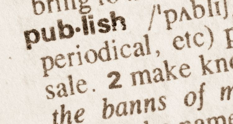 Zoomed in photo of the word Publish in a dictonary. Other words decorate the page, but are cut off.