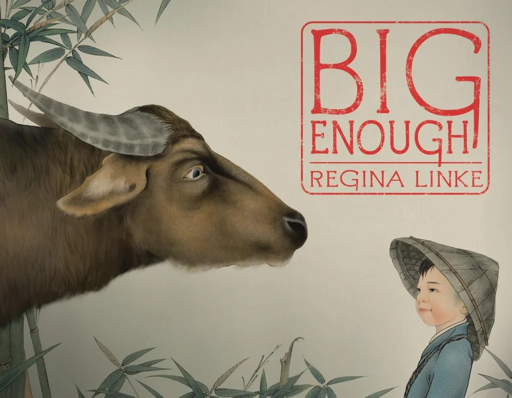 The book cover for Big Enough. A painted illustration of an ox looking at a young Asian boy wearing traditional farming attire: a blue tunic and a peaked straw hat. There are bamboo shoots around them. Big Enough is in red lettering enclosed in a red square.