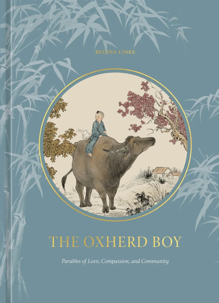 The book cover for The Oxherd Boy: Parables of Love, Compassion, and Community. A blue background with pale blue outlines of bamboo shoots. In the center, is a circle painting of a young Asian boy wearing a traditional blue tunic and trousers riding an ox. They are surrounded by yellow and pink trees and there is a farmhouse in the distance. The circle is outlined in green and gold. The Oxherd Boy: Parables of Love, Compassion, and Community is in gold and pale blue lettering.