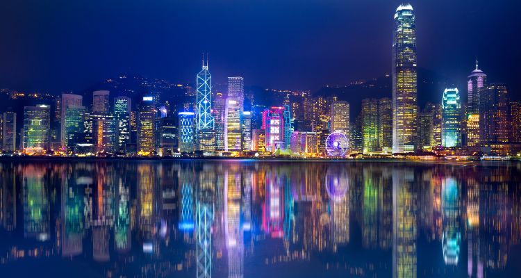 A skyline night time snapshot of Hong Kong light up at night.