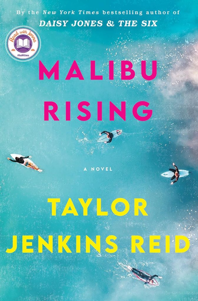 Malibu Rising by Taylor Jenkins Reid book cover. The ocean from above with four surfers on their boards.