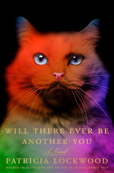 Book cover of "Will There Ever Be Another You" by Patricia Lockwood. A regal, orange cat with bright blue eyes is set against a black background, framed by a rainbow gradient.