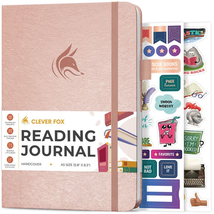 A pink journal with the Clever Fox logo, the head of a fox, on the center. The stickers included fan out from the pages.