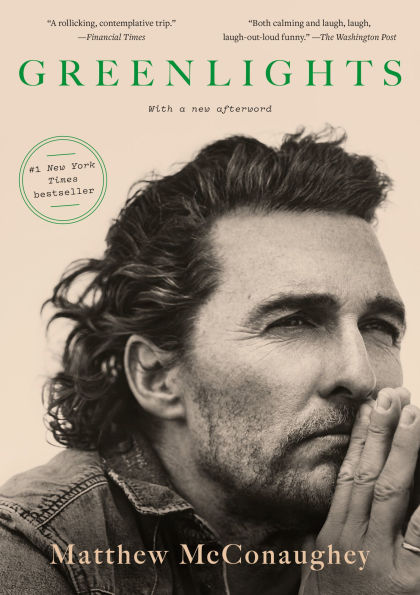Book cover of "Greenlights" by Matthew McConaughey. Man with contemplative expression, hands near mouth, black and white tones.