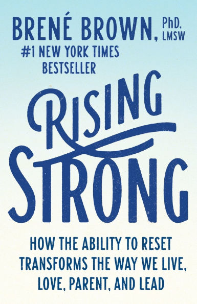 Book cover of "Rising Strong" by Brené Brown features bold blue text on a light gradient background.