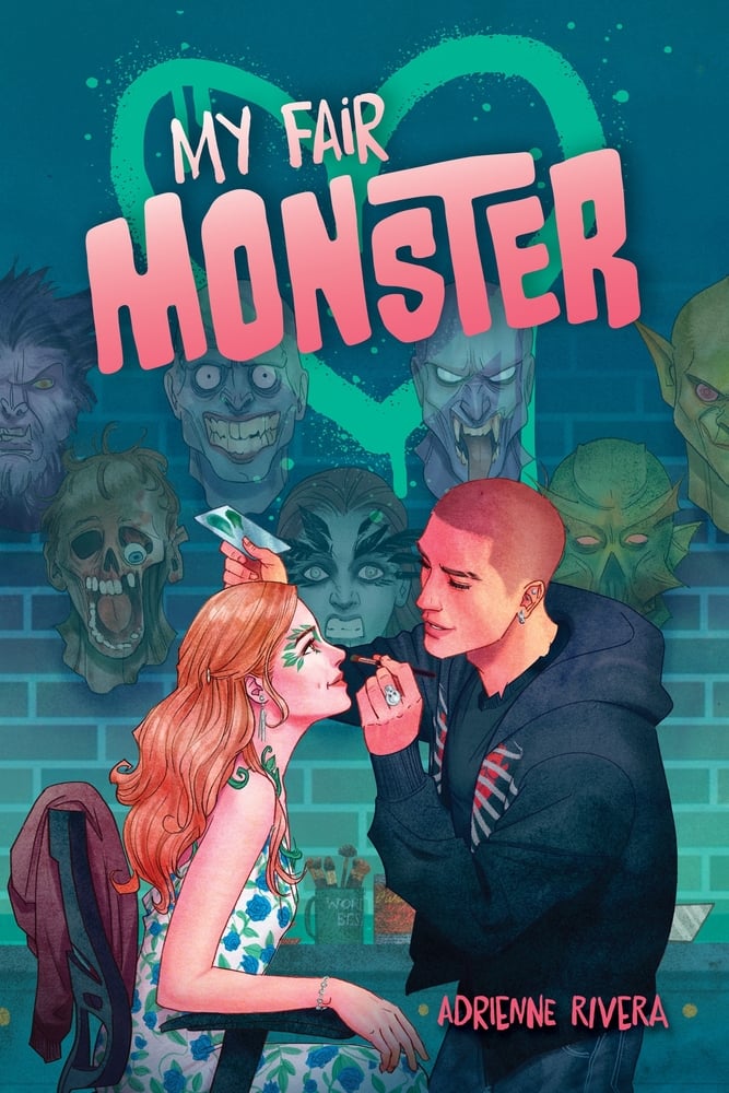 My Fair Monster by Adrienne Rivera Book cover depicting an illustration of a teenage boy doing a teenage girl's makeup. The girl is wearing a floral dress and has green paint around her eyes. In the background are various horror masks against a brick wall, while the title is in pink, surrounded by a green heart at the top of the cover.