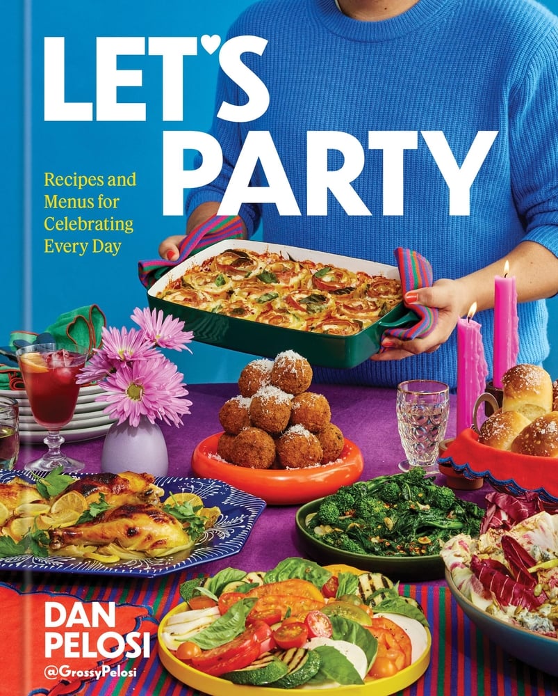 Let's Party by Dan Pelosi book cover, depicting someone in a blue sweater carrying a casserole in front of a table that is full of colorful plates of food. The Title is at the top in white, bold letters with a heart serving as the apostrophe in the word "let's."