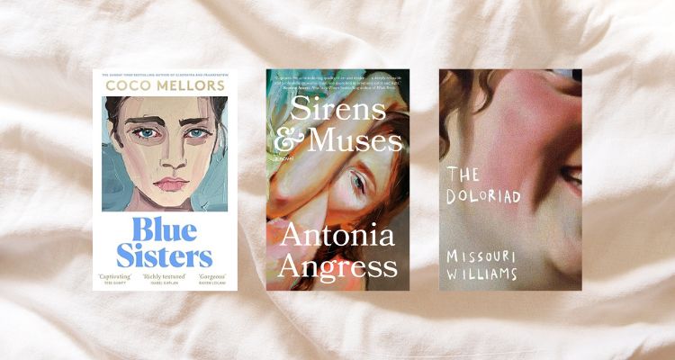 Depicts Blue Sisters by Coco Mellors book cover, a woman looking sad. Sirens & Muses by Antonia Angress book cover, a half a woman's face with the other half covered by her arm. The Doloriad by Missouri Williams a close up of a persons face smiling widely.