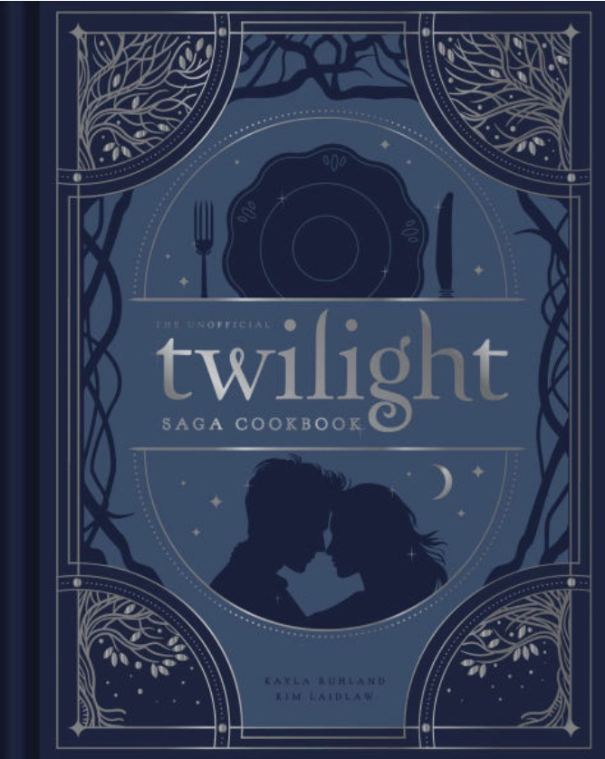 Cover of The Unofficial Twilight Saga Cookbook by Kayla Ruhland and Kim Laidlaw. The design features a dark blue palette with silver accents, a silhouetted couple framed by trees, and celestial elements like stars and a crescent moon.
