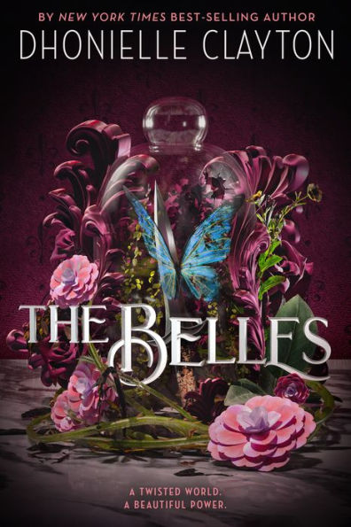 Book cover of "The Belles" by Dhonielle Clayton features a colorful butterfly amidst swirling pink and purple flowers.