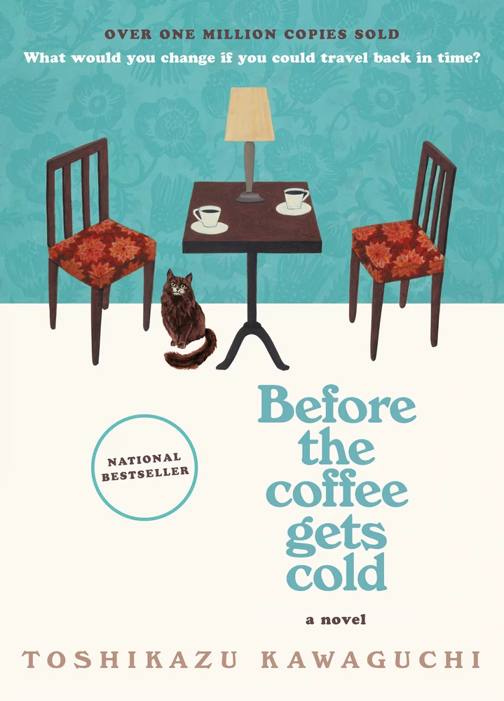 Before the Coffee Gets Cold by Toshikazu Kawaguchi book cover. Depicts a table with two chairs at a coffee shop with two mugs of coffee and a lamp on the table and a cat below the table.