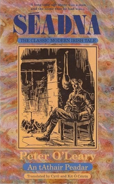 Séadna by Peter O’Leary. An orange-tinted woodcut-style illustration of a man seated near a hearth, framed by a marbled background and the title “Séadna” in blue and orange lettering.